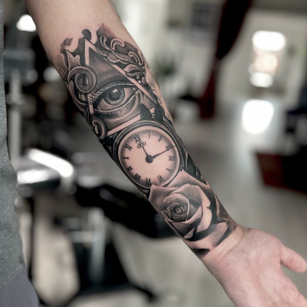 Clocked Eye Forearm Black And White Tattoo