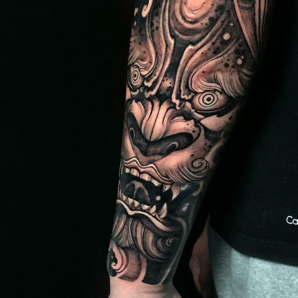 Demon Hand Black And Grey Tattoo