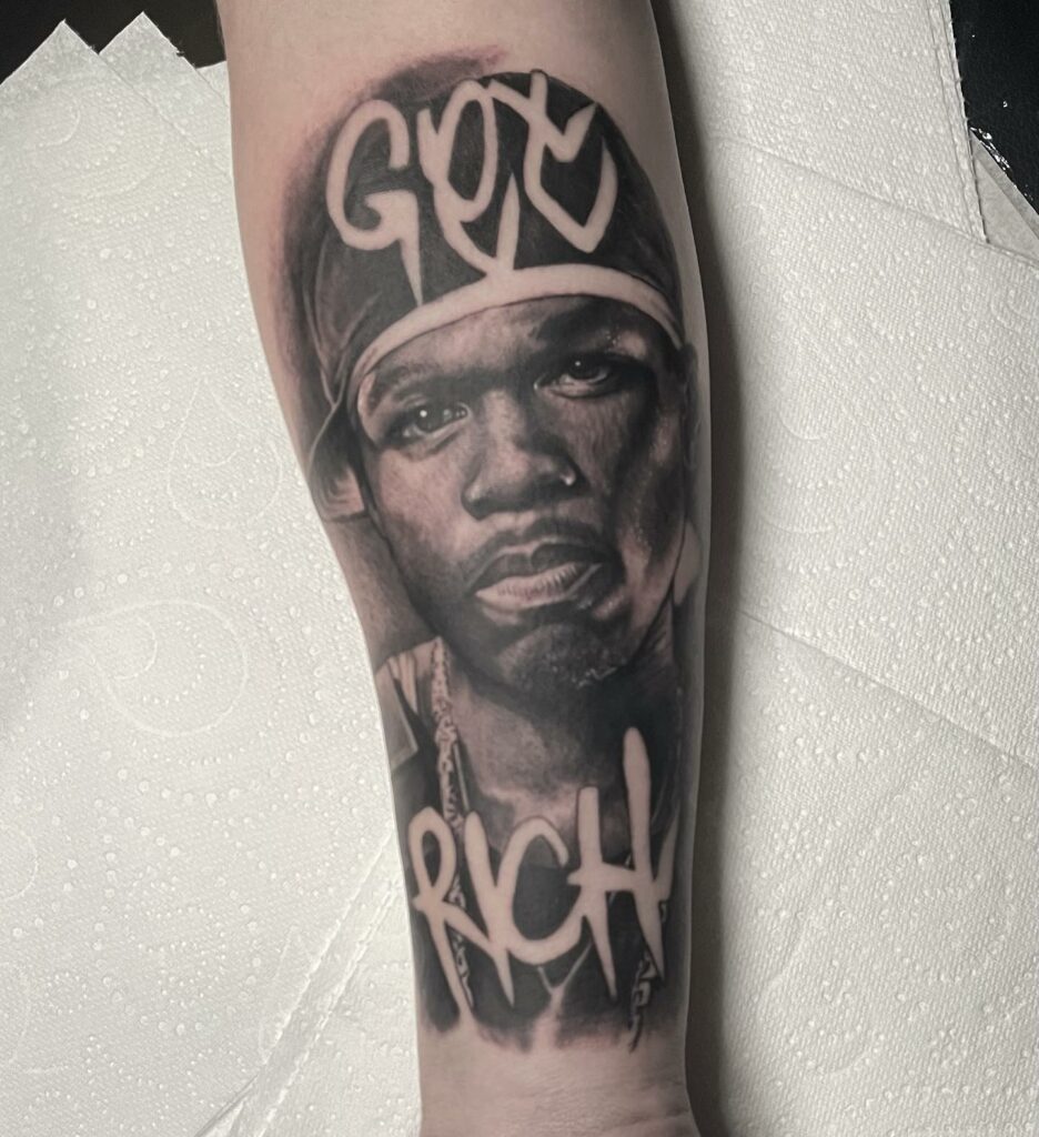 Rich Rapper Forearm Black And Grey Tattoo