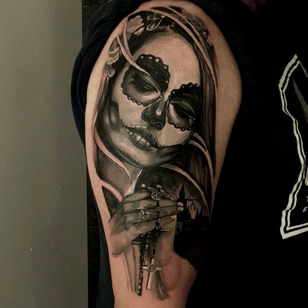 Women Christ Symbol Arm Black And White Tattoo